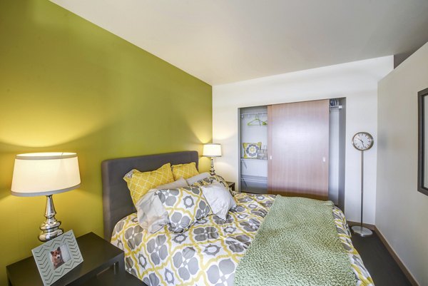 Spacious bedroom with modern decor in Link Apartments