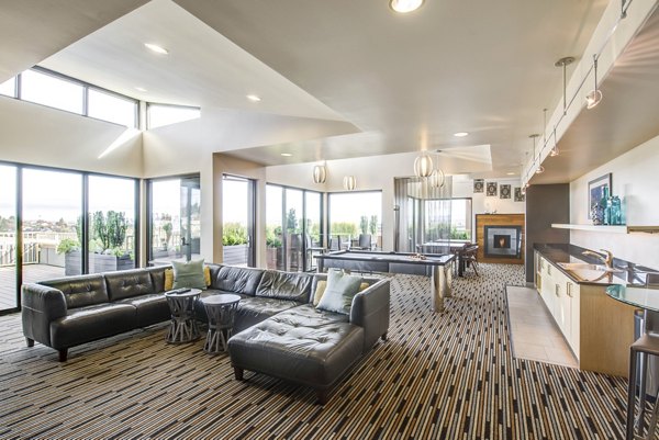 Modern clubhouse with stylish seating and vibrant decor at Link Apartments luxury residence