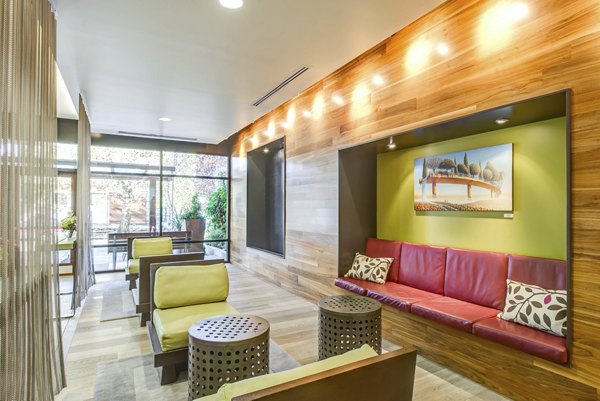 Modern clubhouse at Link Apartments featuring stylish seating and social spaces for residents