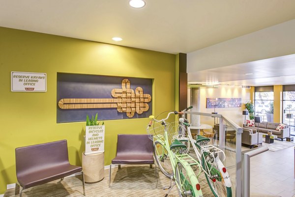 Clubhouse with modern seating and large windows at Link Apartments