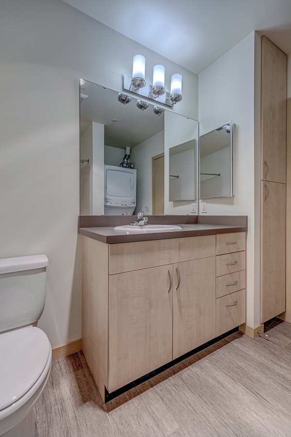 Modern bathroom featuring sleek fixtures at Prescott Apartments