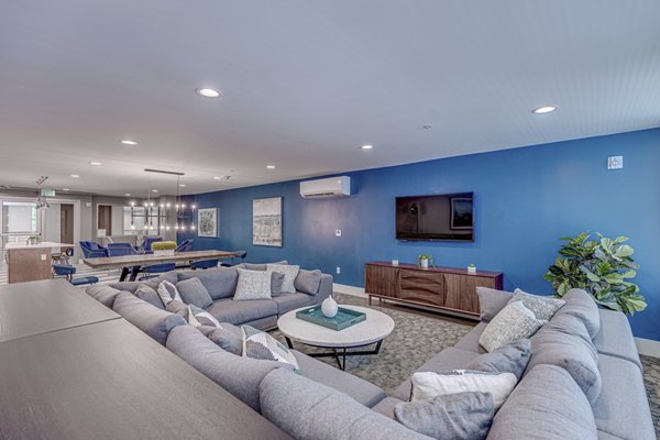 Inviting lobby with modern seating in Prescott Apartments clubhouse