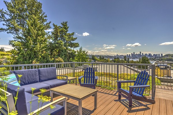 Cozy patio area with modern seating at Prescott Apartments, perfect for relaxation and outdoor gatherings