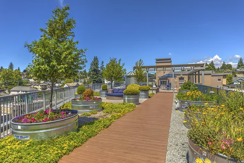 Patio area with seating and fire pit at Prescott Apartments, a Greystar luxury community