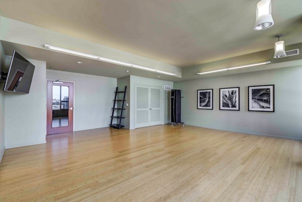 Yoga/spin studio with modern fitness equipment at Aspira Apartments