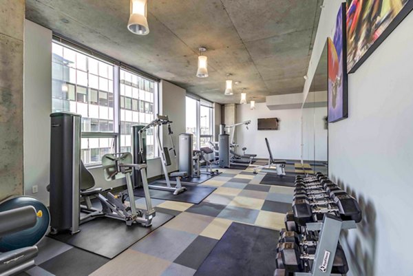 Fitness center with modern equipment at Aspira Apartments