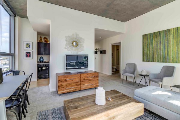 Contemporary living room with open layout at Aspira Apartments, Seattle
