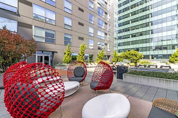Courtyard at Aspira Apartments featuring modern landscaping and comfortable seating in downtown Seattle
