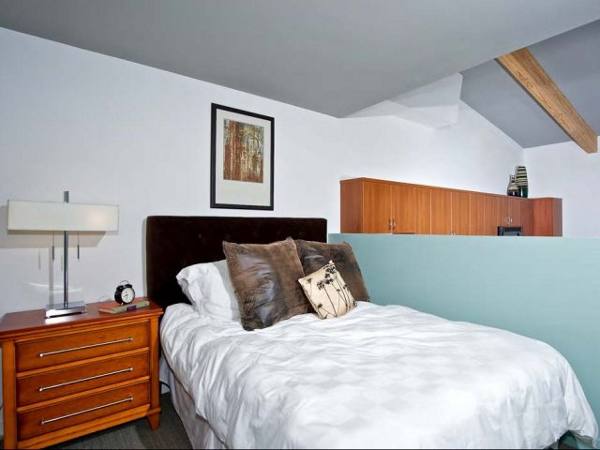 bedroom at Seventh&G Apartments