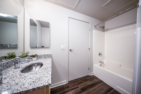 Bathroom featuring modern fixtures at Tenth & G Apartments in Greystar's luxury portfolio