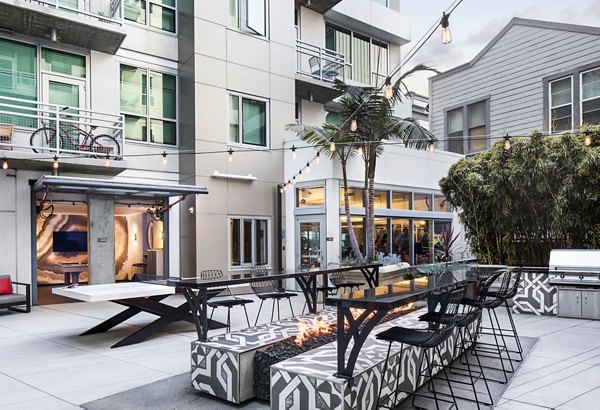 Cozy fire pit lounge area at Tenth&G Apartments