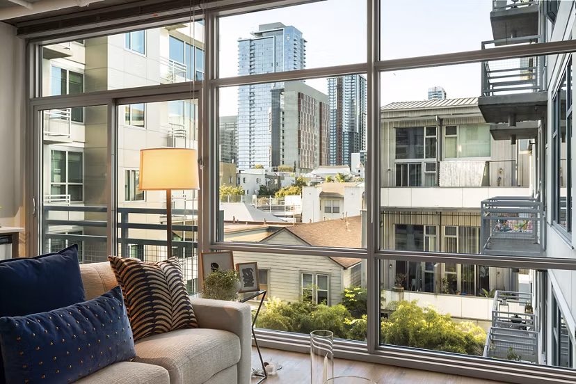 Business center with modern workstations at Tenth&G Apartments
