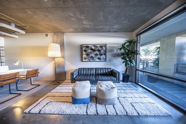 Business center with modern workstations at Tenth&G Apartments