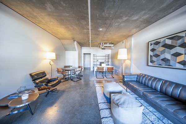 Tenth&G Apartments: Modern business center with sleek workstations and communal meeting spaces