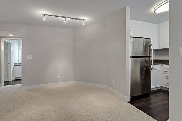 Dining area with modern decor and natural lighting at Holly Street Village Apartments