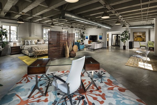 Modern kitchen with stainless steel appliances at Holly Street Village Apartments