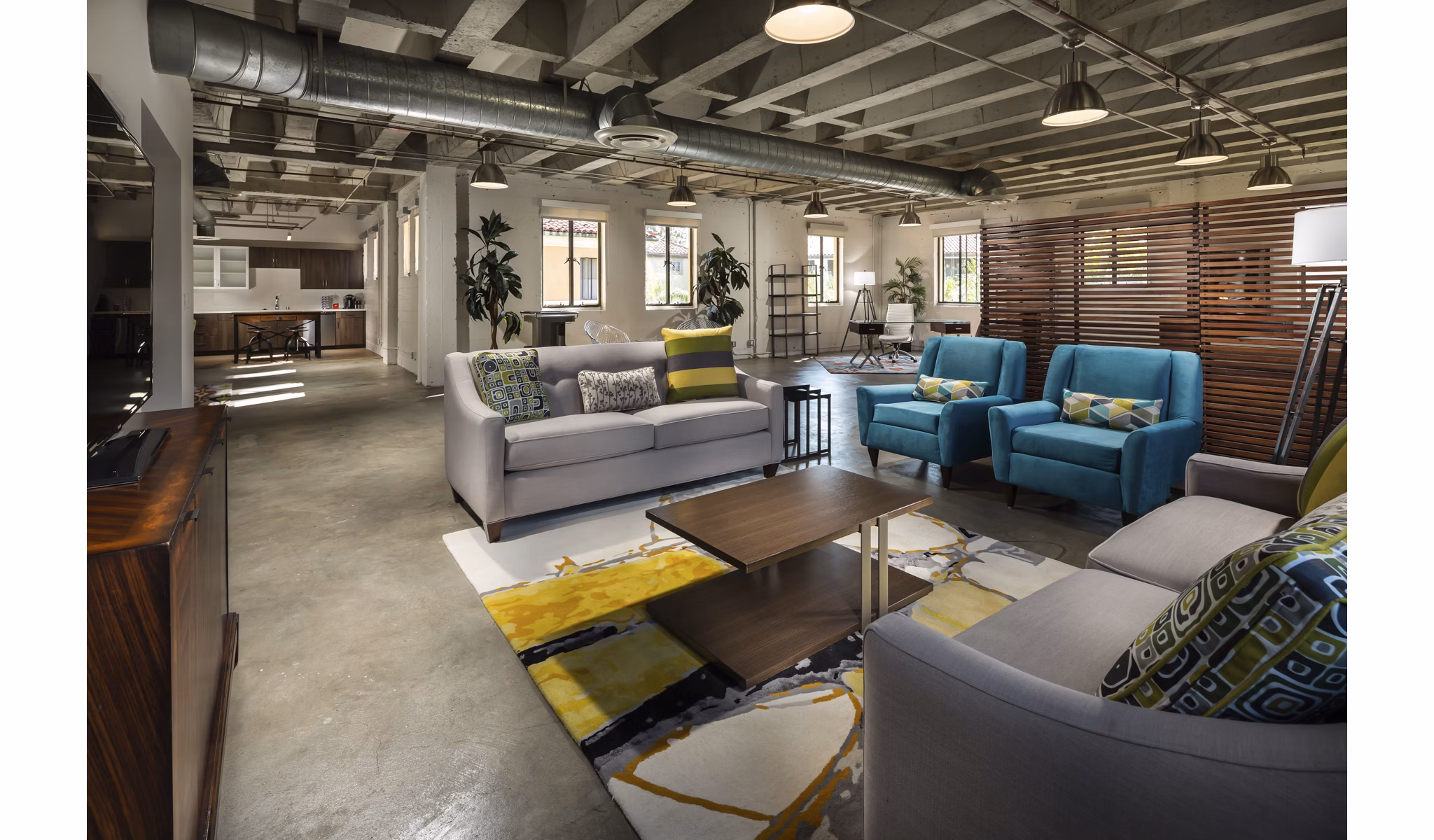 Spacious living room with modern decor in Holly Street Village Apartments