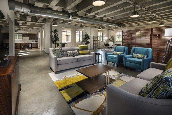 Spacious living room with modern decor in Holly Street Village Apartments