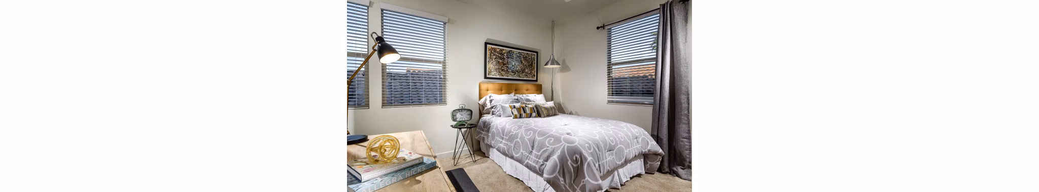 Cozy bedroom with modern decor at Montecito at Dos Lagos Apartments