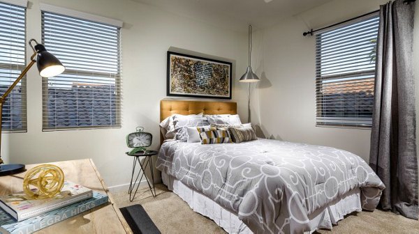 Cozy bedroom with modern decor at Montecito at Dos Lagos Apartments