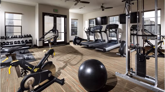 Fitness center featuring modern equipment at Montecito at Dos Lagos Apartments
