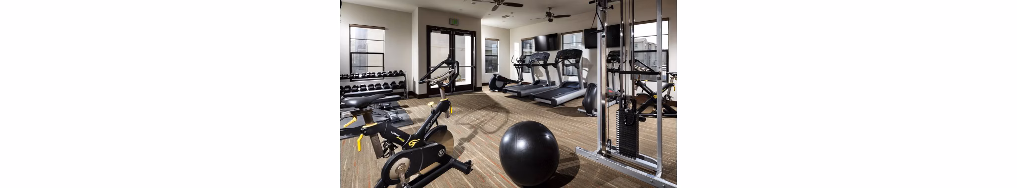 Fitness center featuring modern equipment at Montecito at Dos Lagos Apartments