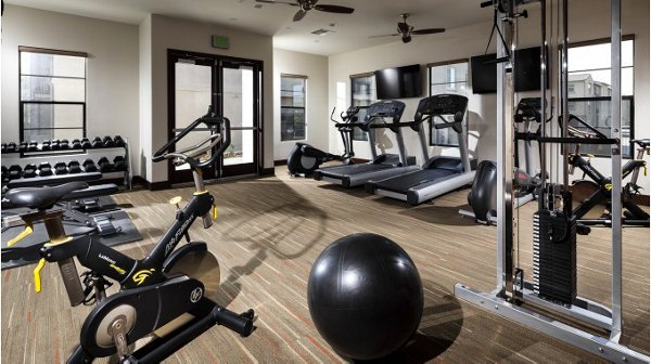 Fitness center featuring modern equipment at Montecito at Dos Lagos Apartments