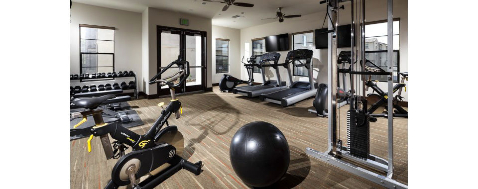 Fitness center featuring modern equipment at Montecito at Dos Lagos Apartments