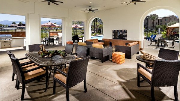 Cozy outdoor patio with modern seating at Montecito at Dos Lagos Apartments