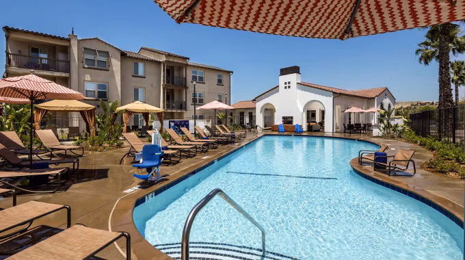 Luxurious pool area at Montecito at Dos Lagos Apartments with resort-style amenities for ultimate relaxation