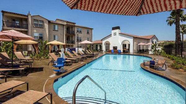 Luxurious pool area at Montecito at Dos Lagos Apartments with resort-style amenities for ultimate relaxation