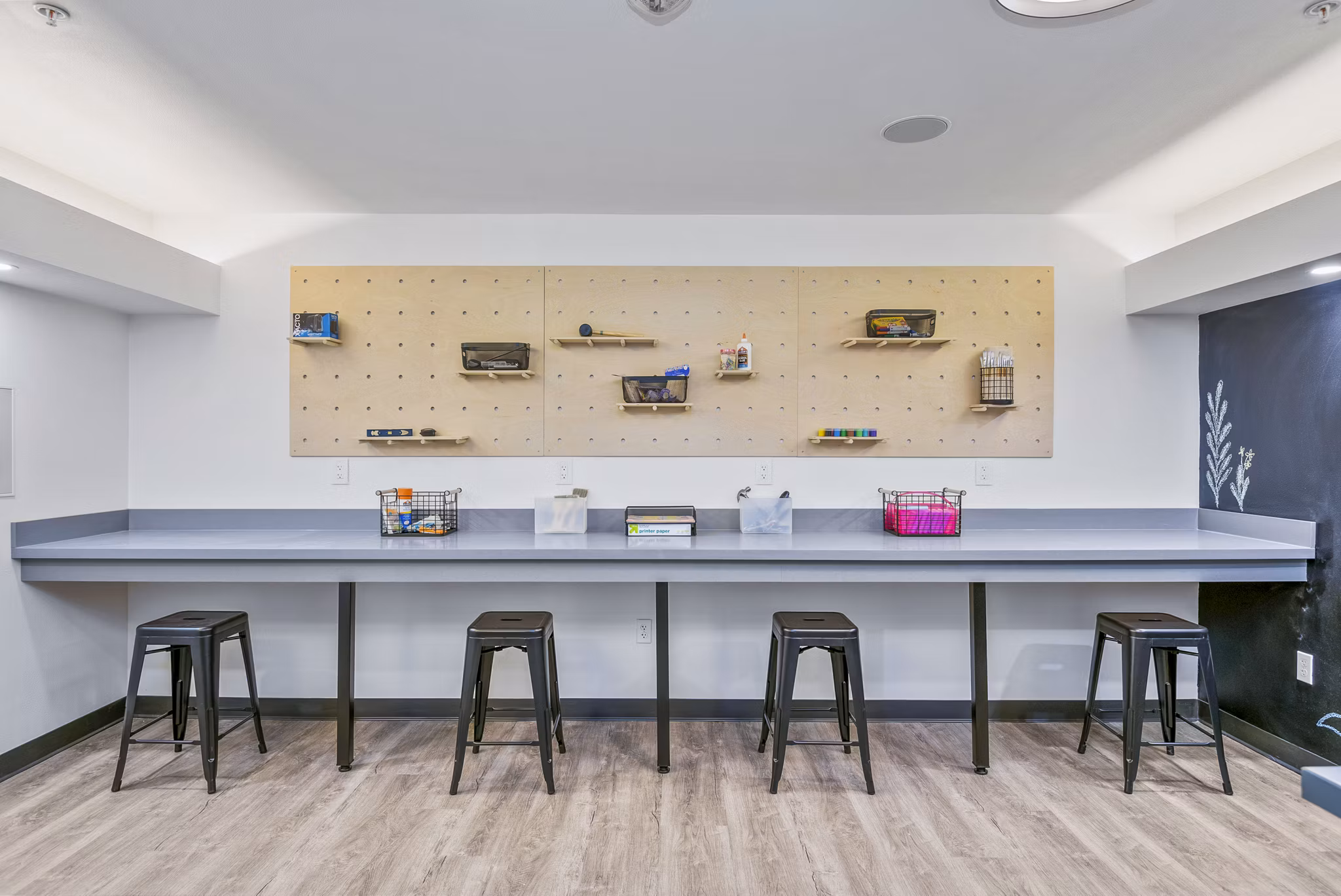 Modern clubhouse with sleek design at The Station at Othello Park Apartments