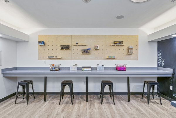 Modern clubhouse with sleek design at The Station at Othello Park Apartments
