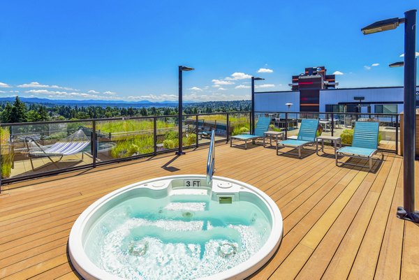 Relaxing rooftop hot tub at The Station at Othello Park Apartments offering scenic views
