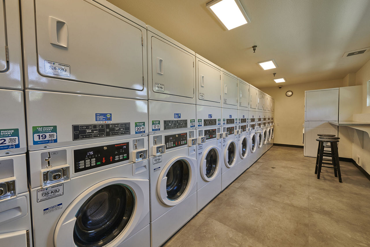 Laundry room at Village Creek Apartments