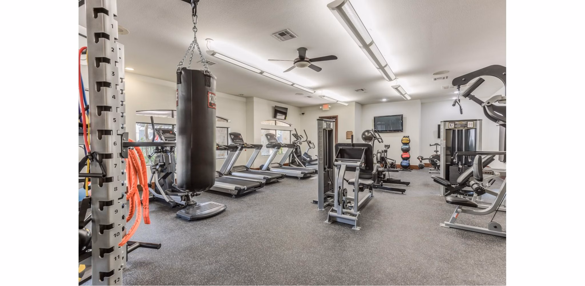 fitness center at Deseo at Grand Mission Apartments