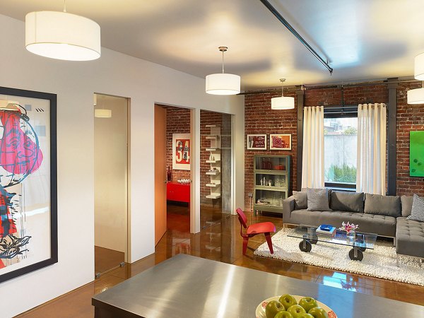 Chic living room with plush seating and modern decor at Arc Light Apartments