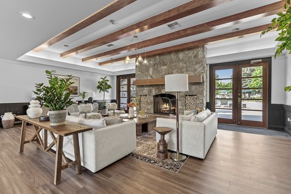 Stylish clubhouse with cozy seating and modern decor at Big Trout Lodge Apartments