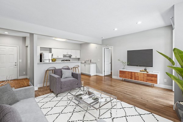 Spacious living room with modern decor at Big Trout Lodge Apartments