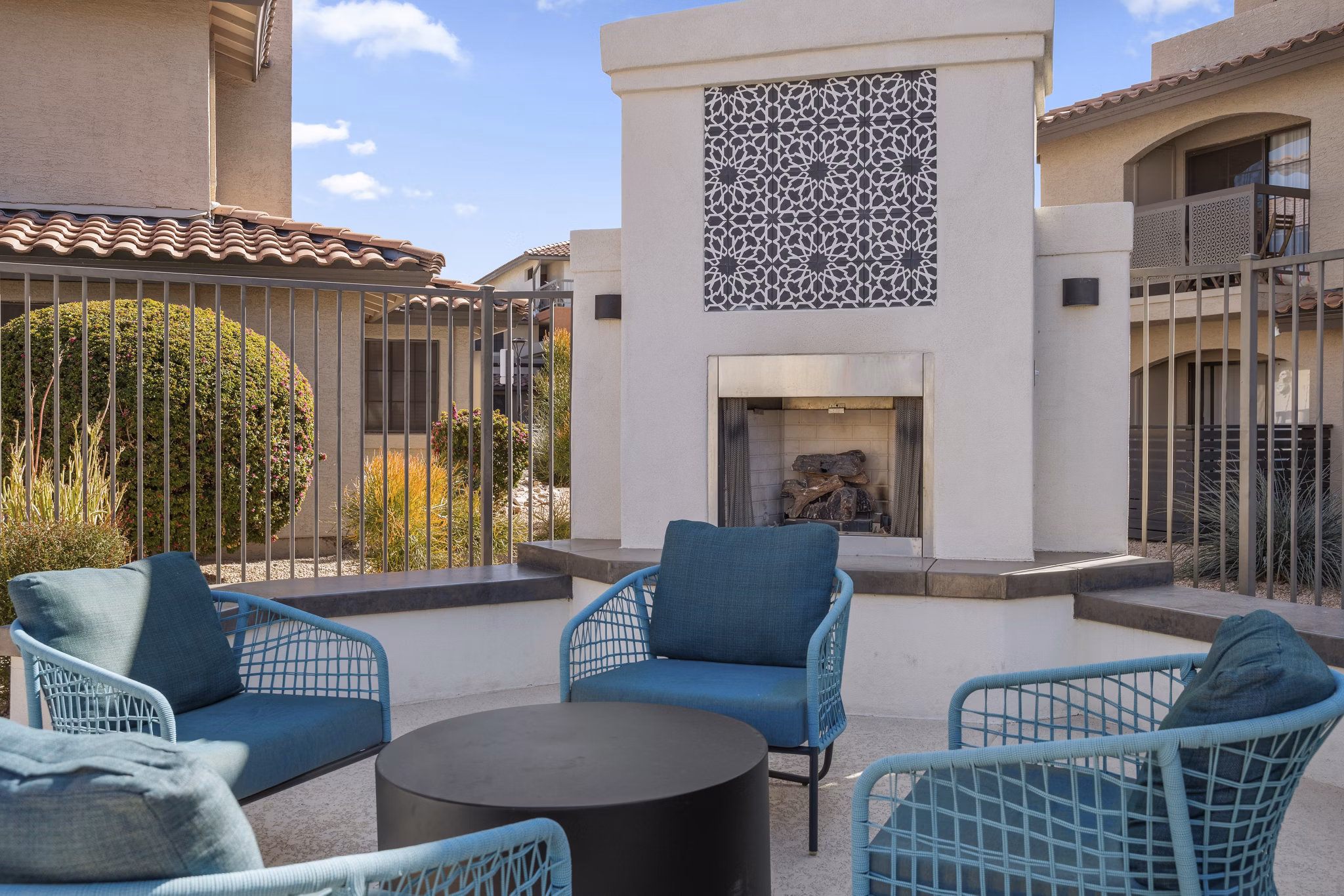 Cozy fire pit at Chazal Scottsdale Apartments, perfect for evening gatherings and relaxation in luxury settings