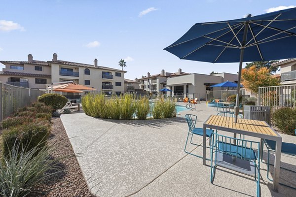 Spacious patio with modern furniture at Chazal Scottsdale Apartments in Arizona