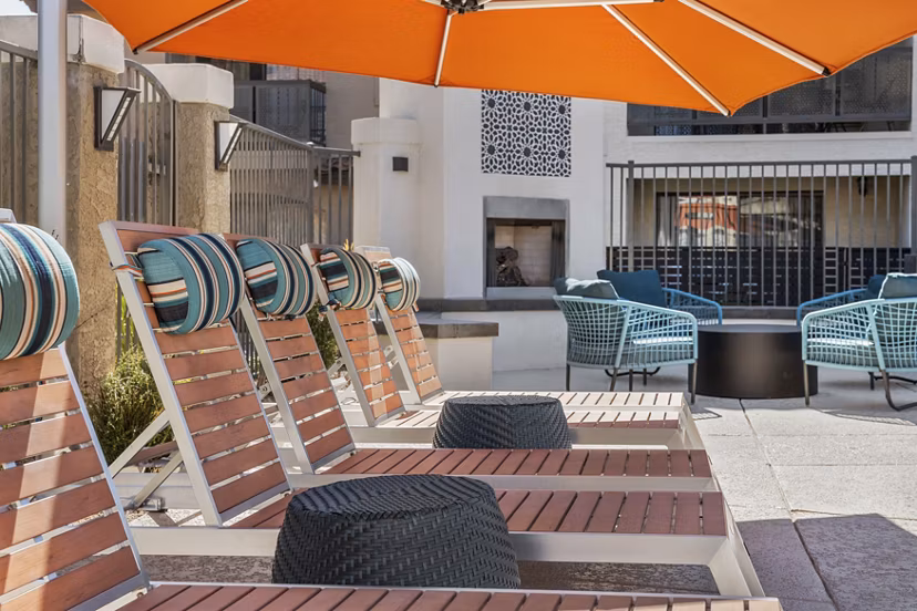 Chazal Scottsdale Apartments: Cozy patio with modern seating and lush landscaping perfect for relaxation