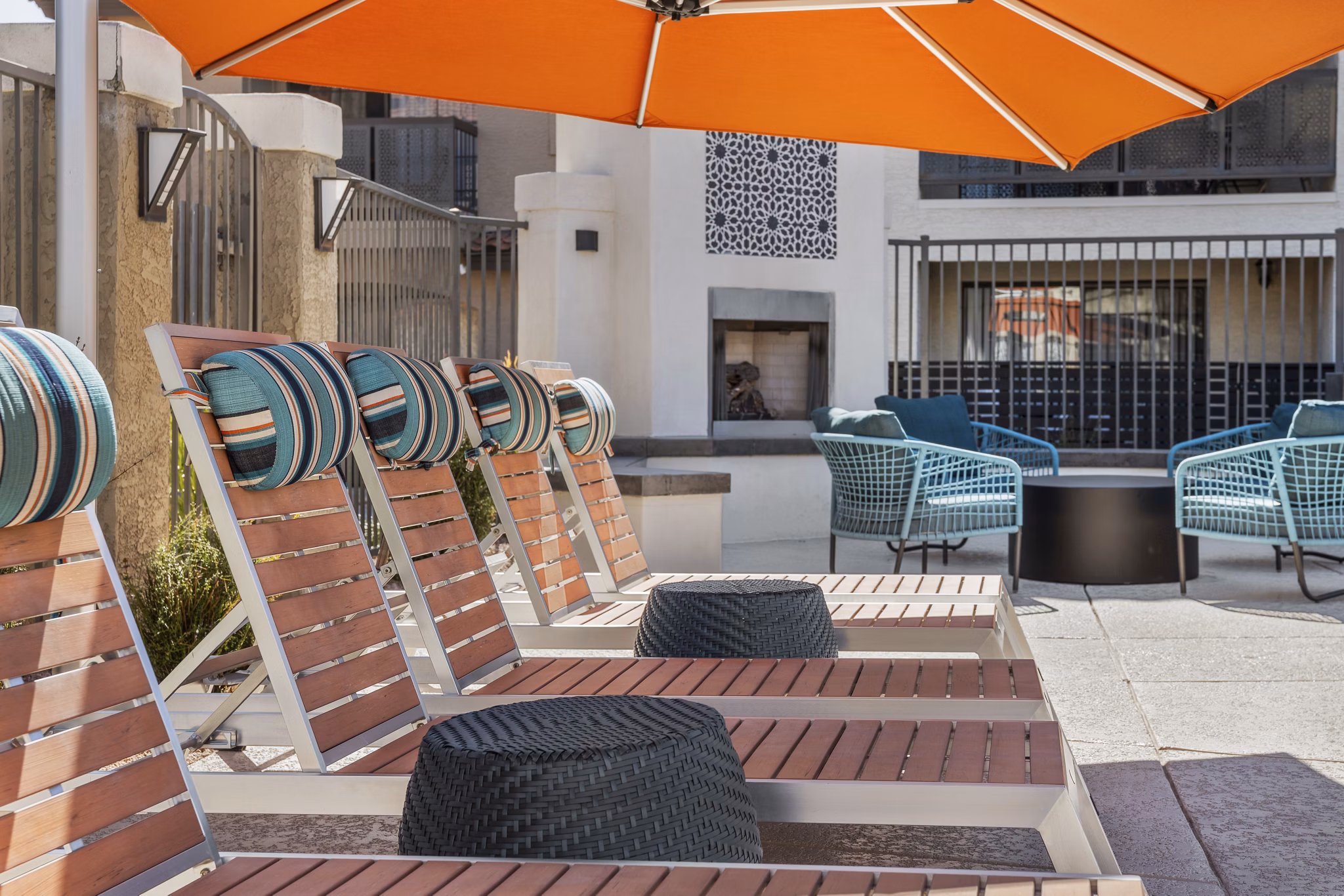 Chazal Scottsdale Apartments: Cozy patio with modern seating and lush landscaping perfect for relaxation