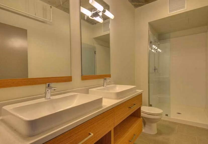Modern bathroom with sleek fixtures in The Wilson Building Apartments