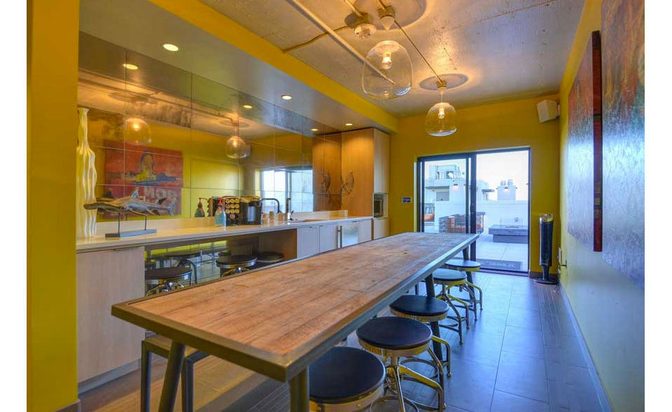 Clubhouse featuring modern design at The Wilson Building Apartments, a Greystar luxury community