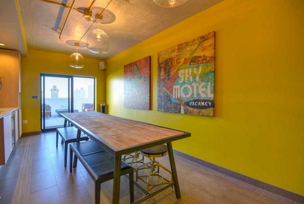 Stylish clubhouse at The Wilson Building Apartments featuring modern design and lounge areas
