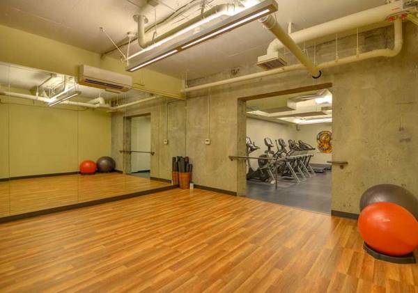 fitness center at The Wilson Building Apartments
