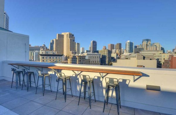 Stunning rooftop deck at The Wilson Building Apartments offering luxury city views and social space for residents