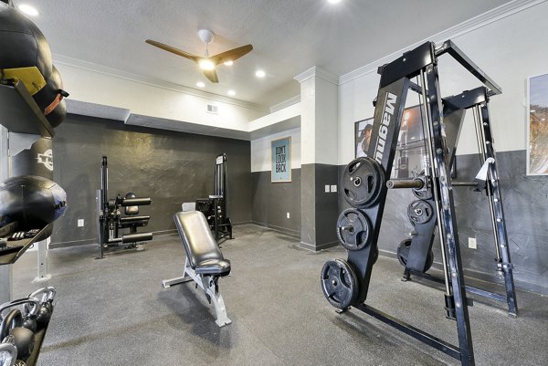 fitness center at San Miguel Apartments