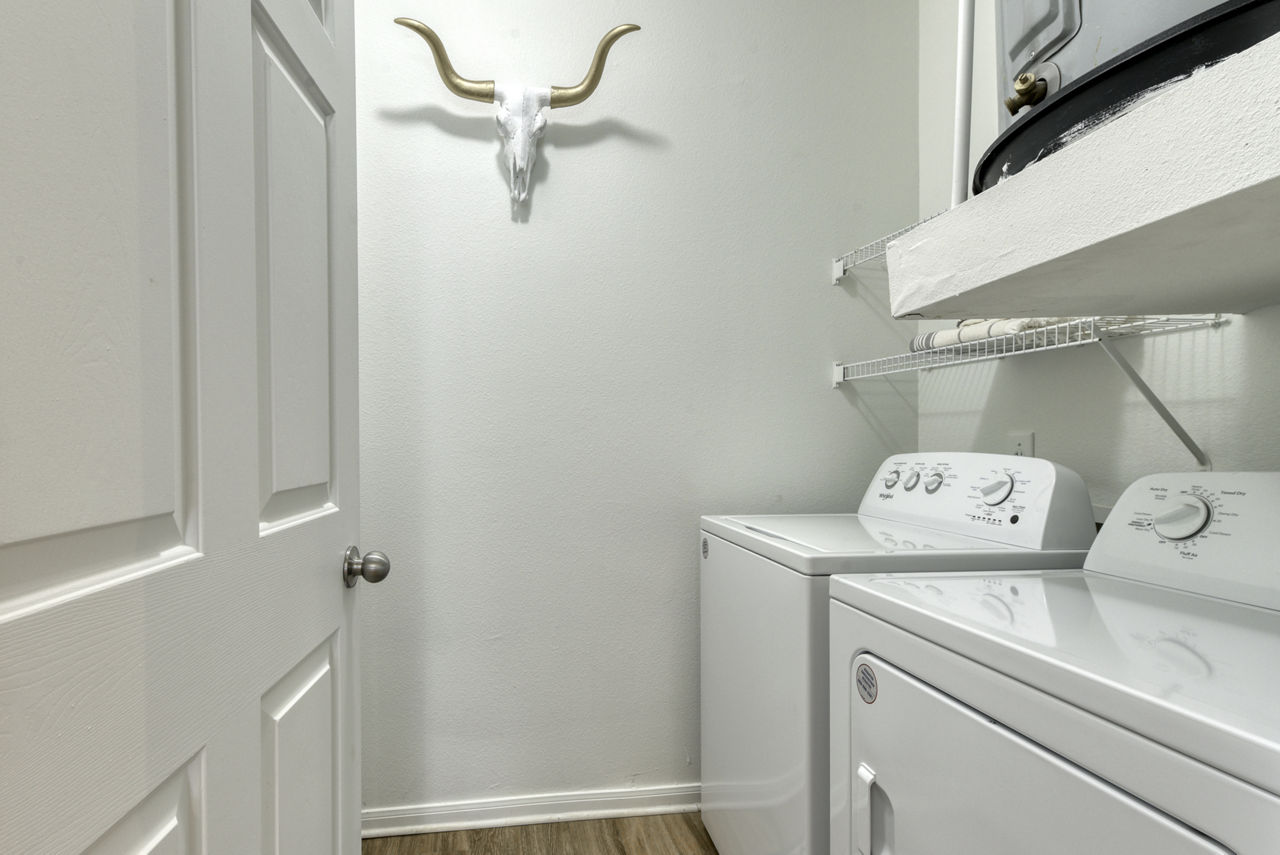 Laundry room at San Miguel Apartments